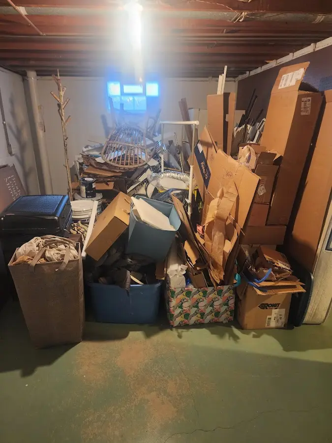 Roll-off dumpster container at job site for 2 Yard Dumpster Rental in Bailey's Crossroads